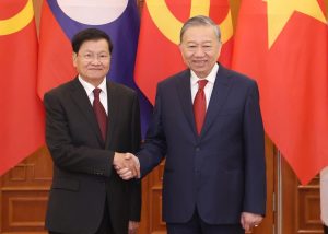 Làm sâu sắc và thực chất hơn nữa quan hệ hợp tác toàn diện Việt Nam Lào