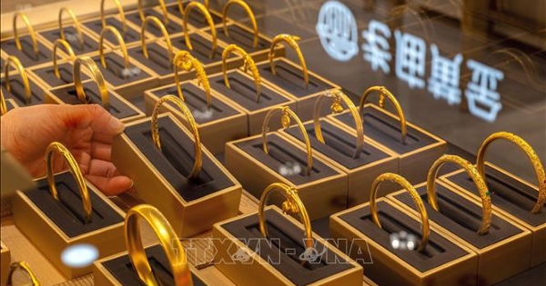 Vàng mất mốc 5.000 USD/ounce trong phiên giao dịch trầm lắng